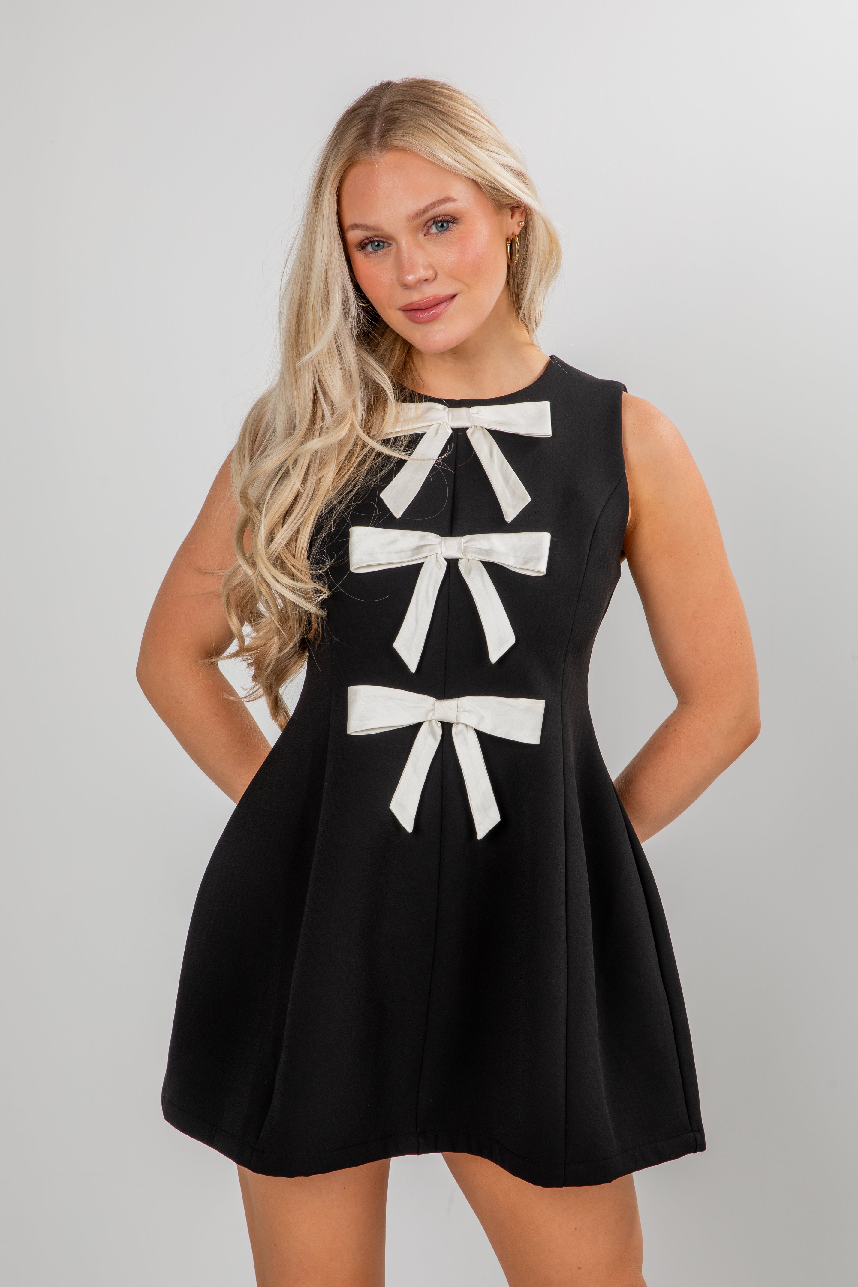 FINAL SALE - Enchanting Presence Black Bow Mini Dress