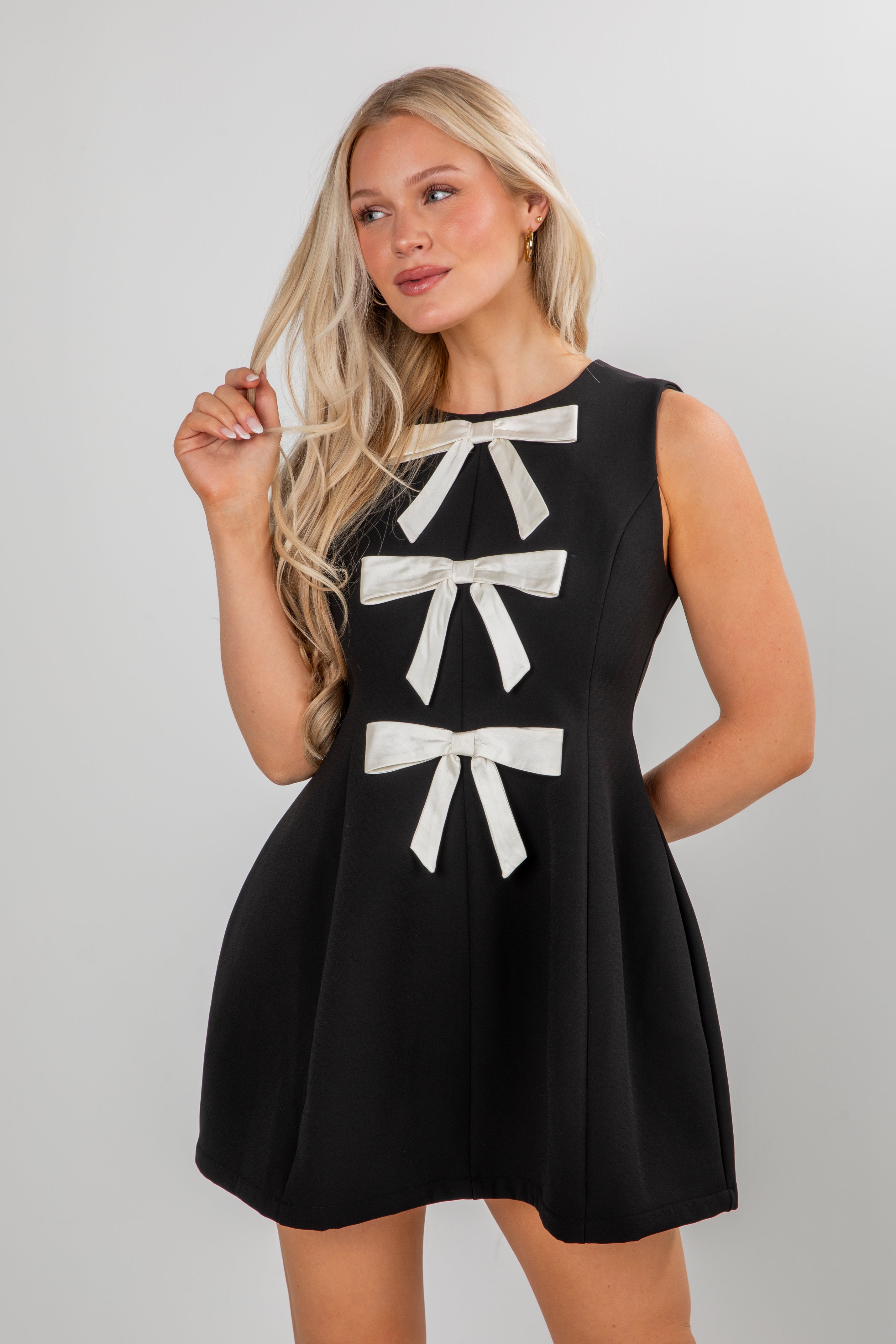 FINAL SALE - Enchanting Presence Black Bow Mini Dress